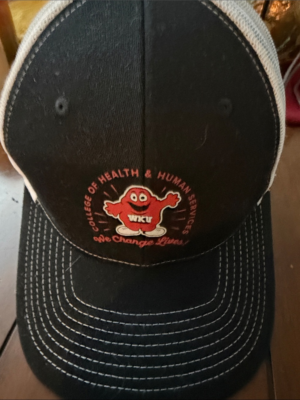 WKU College of Health & Human Services Black Trucker Hat with Red Mascot
